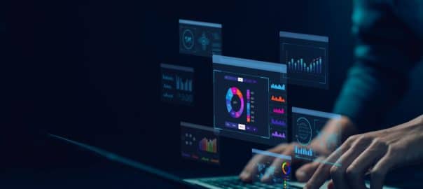 Analyst manages the system database, and analysis data plans, and reports. shows a dashboard chart on the computer. research on platform digital technology.