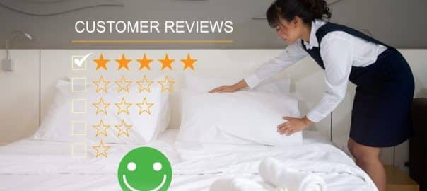 Young asian hotel maid making the bed. Show rating of service experience, evaluate quality of service leading to reputation ranking of hotel business.