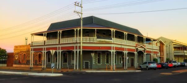Old historic hotel and houses on downtown street in Broken hill city of Outback Australia - mining industry.