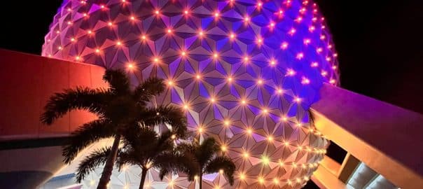 Bay Lake, Florida - January 4th 2022 - EPCOT Disney Park Ball Spaceship Earth Lit Up at Night Time LED Lights.