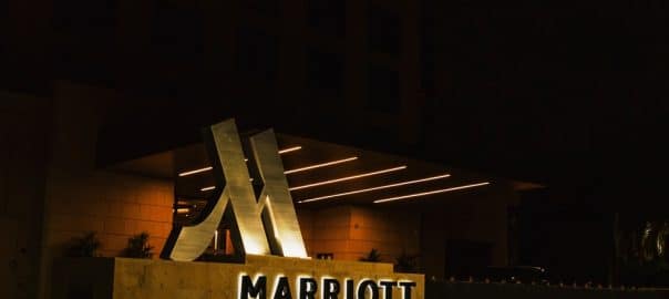 Irvine, California - April 21 2024: Marriott Hotel Sign Glowing in the Night.